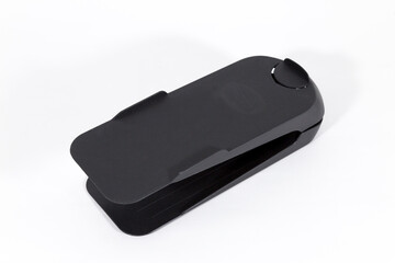 
Shoe Organizer - Shoe. mobile accessory.
Black color. Durable plastic. For any type of footwear. White background.