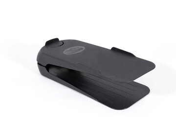 
Shoe Organizer - Shoe. mobile accessory.
Black color. Durable plastic. For any type of footwear. White background.