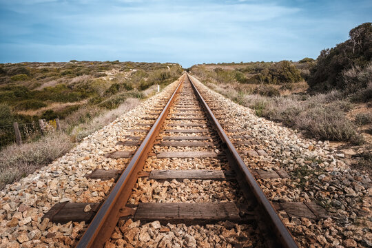 The parallel lines of a railway track disappearing into the distance at Ajgajola in the Balagne region of Corsica