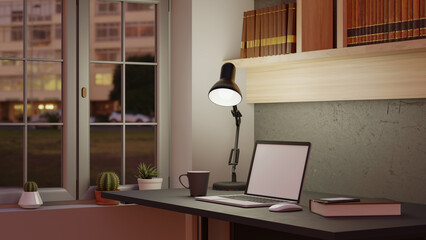 Office at night, dark workspace, blank screen desktop computer mockup on a desk with light from the table lamp, decor and blurred office interior in the background, 3d rendering