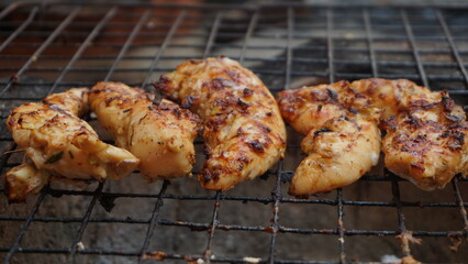 meat of chicken  on the grill
