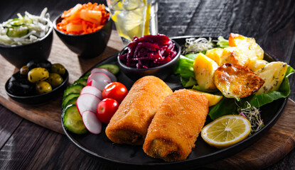 Breaded and deep-fried croquettes with potatoes and vegetables