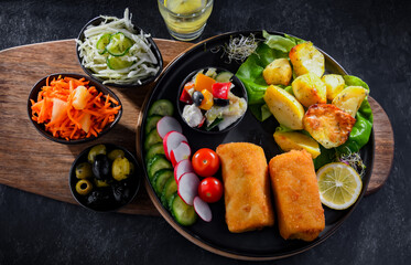 Breaded and deep-fried croquettes with potatoes and vegetables