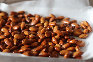 Candied almonds. Toasted almonds coated with caramel syrup