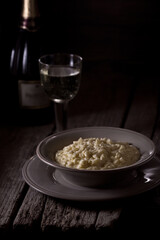 Dinner, rice with wine. Photo of food on a dark background