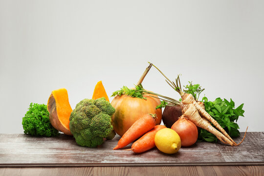 Mix of healthy vegetables on the table. Photo of food on a dark background