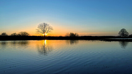 Sunset over a flooded meadow