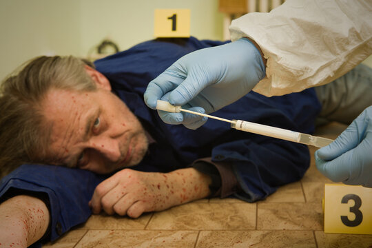 Crime scene investigation - collecting of blood samples for laboratory