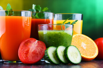 Glasses with fresh organic vegetable and fruit juices - obrazy, fototapety, plakaty