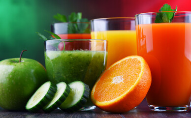 Glasses with fresh organic vegetable and fruit juices