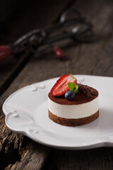 Sweetness cupcake with strawberries. food photography, dark background