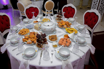 moroccan ramadan iftar meal, harira soup, chebakia, dates,