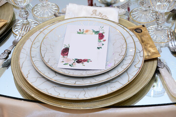 A marquee interior set up for wedding guests.