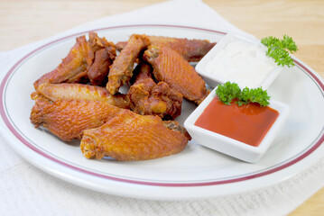 Spicy Deep Fried Buffalo Wings Served with Hot Sauce and Blue Cheese Dressing	