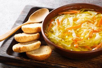 Vegetable Julienne Soup Portuguese Sopa Juliana closeup in the plate on the table. Horizontal