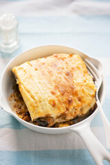 Moussaka with pork and courgettes