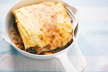 Moussaka with pork and courgettes