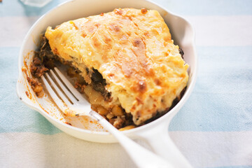 Moussaka with pork and courgettes