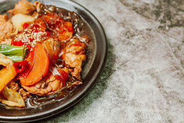 Andongjjimdak, Korean Braised Chicken : To make this dish, chicken is cut into pieces and braised with carrot, potato, and other vegetables, along with a soy sauce-based seasoning. Glass noodles can b