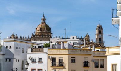 Fototapeta na wymiar Jerez cityscape of downtown with the historic cathedral in the background