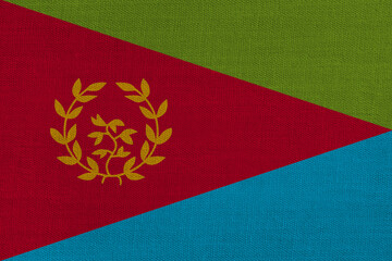 Patriotic textile background in colors of national flag. Eritrea