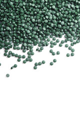 Green tablets made of natural organic spirulina