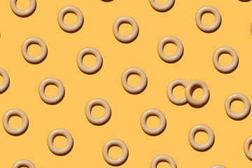 traditional cuisine bagels on orange background pattern