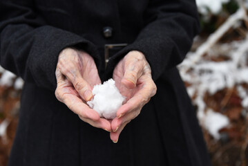 Fiesty Elderly Woman Makes Snowball