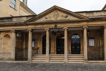 Fototapeta na wymiar City of Bath, UK. Restored ancient Roman Baths in. Entrance to the Pump Room in Roman baths.
