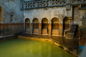 City of Bath, UK. Evening sightseeing of restored in Victorian times ancient Roman Baths.