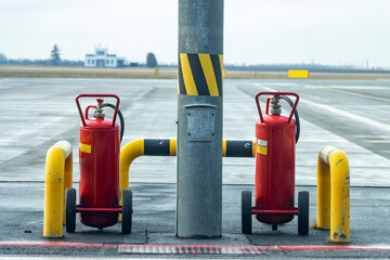 Mobile fire extinguishers ready for use on the airfield