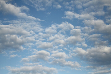 Fototapeta na wymiar Blue sky with many clouds. Day light. Onle sky view
