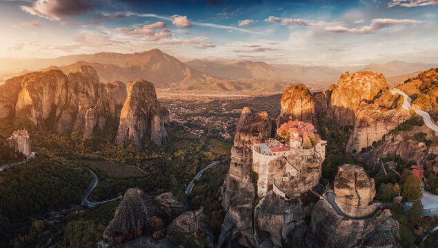 Panoramic view of monastery of Varlaam on top of a sheer cliff. The miracle of Meteora - harmony of man and nature in Greece. A popular tourist and pilgrimage destination