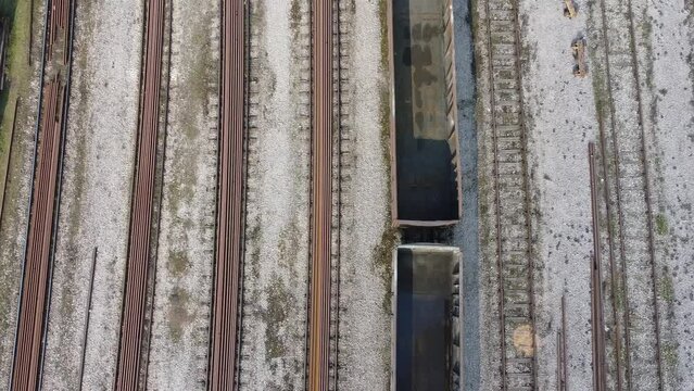 aerial view of empty freight wagons, these wagons are used to transport large quantities of wheat, corn, coal and other materials needed by industry.