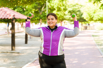 Woman with obesity excited after a workout