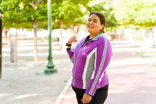 Happy Overweight Woman In Activewear