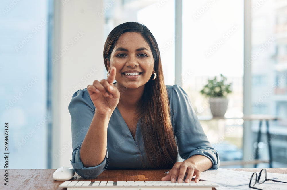 Poster connecting to a wider world of opportunity. portrait of a young businesswoman using a computer in an