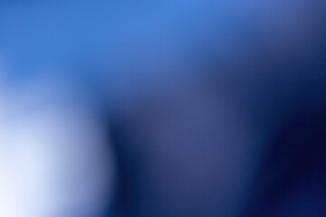 light and dark blue and purple blurred bokeh abstract