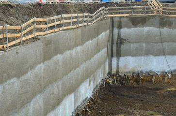 ugly road notch bridgehead. retaining wall with concrete grouting and drainage. excavations for...