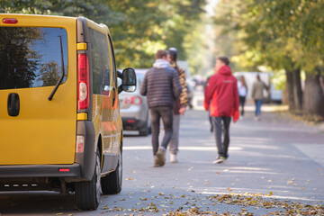 Close up of a car parked illegally against traffic rules on pedestrian city street side