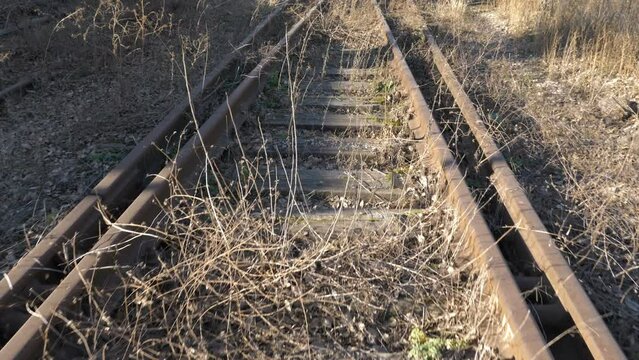 Old Rusty Brown Rails And Wooden Sleepers
