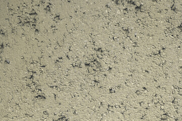 Grey concrete wall with plaster. Background photo texture