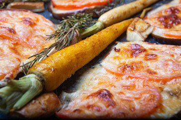 Baked carrots with vegetables and cheese.