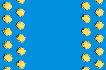 Trendy hard shadow sun light yellow dandelion or chamomile daisy flower on a bright blue background. Isometric hot summer or fall seamless pattern wallpaper design. Funky 90's nostalgia concept.