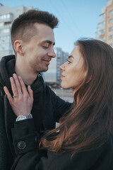 Young loving couple with coffee on ukrainian nature background