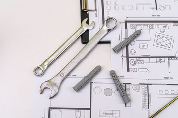 house blueprints with work tools drawing instruments on the worktable