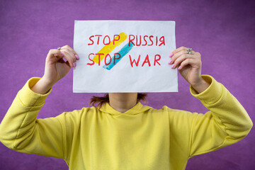 female activist hold poster no war stop war stop putin