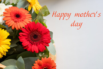 Happy Mothers day greeting card with Beautiful bright flowers bunch at white background.Large beautiful bouquet of chrysanthemums, gerberas.Holiday postcard.