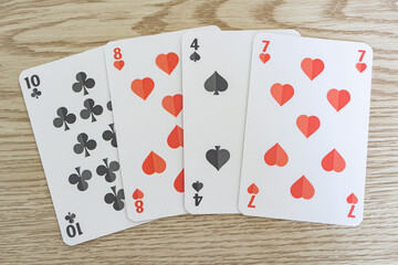 Four playing cards