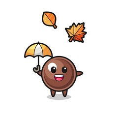 cartoon of the cute tapioca pearl holding an umbrella in autumn